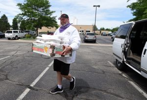Read more about the article Loveland Rotary Club Helping Catering Partner Remain Afloat by Serving Free Food Box to Those Doing Good