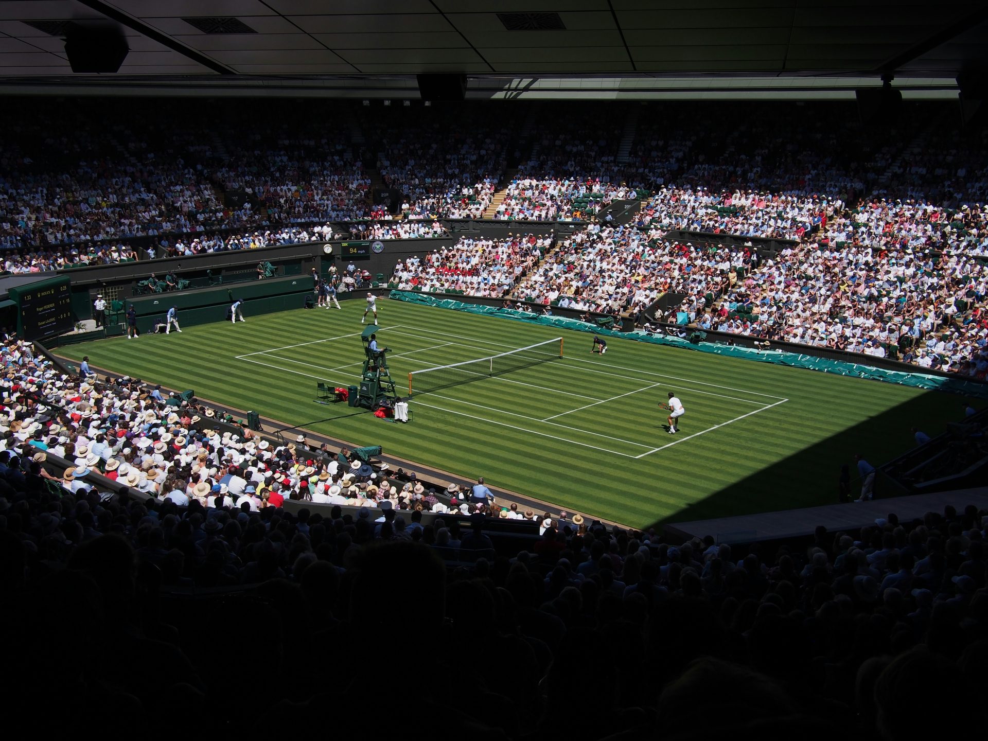 two person playing tennis